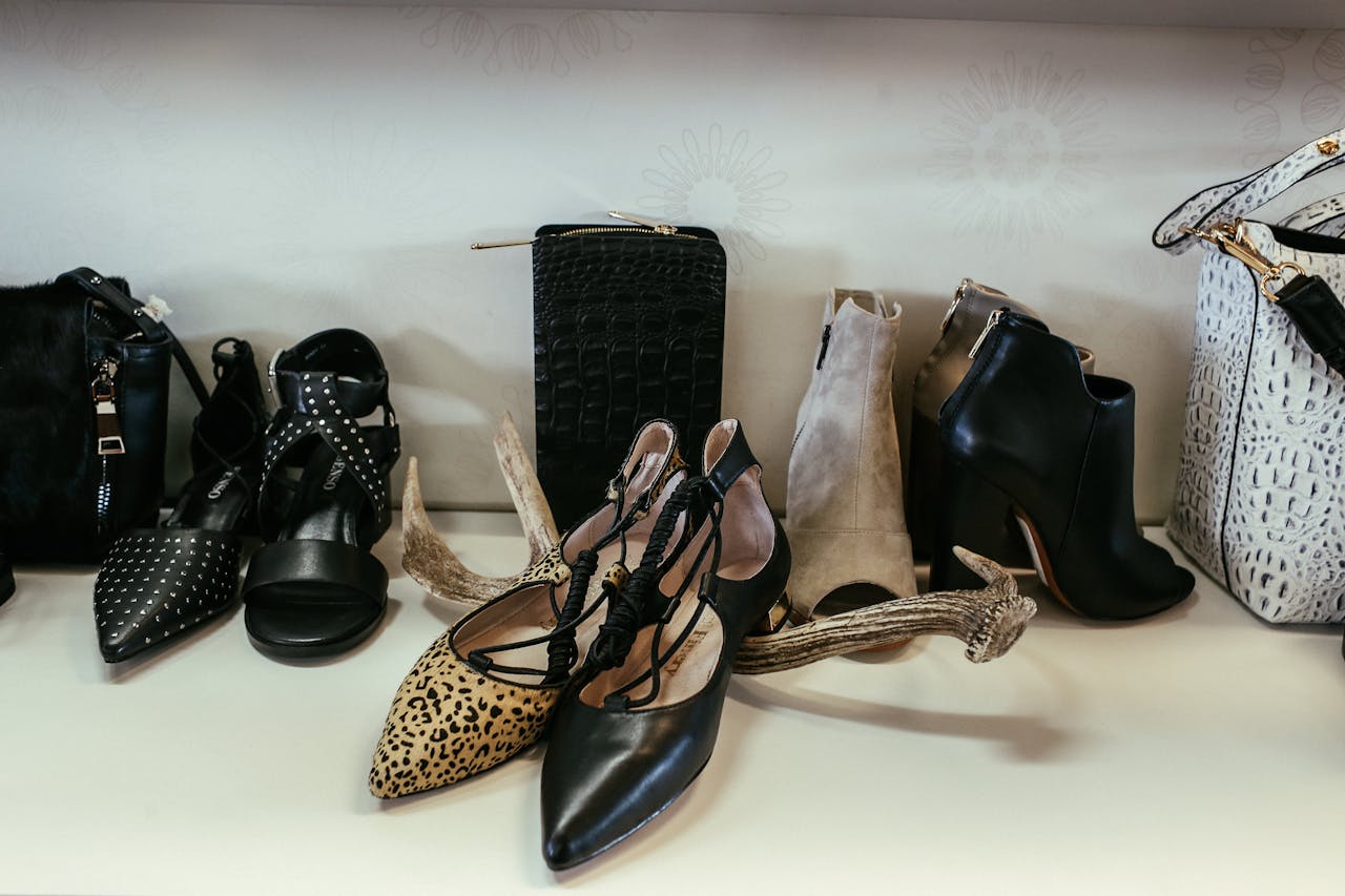 Elegant display of high-end shoes and purses showcasing modern fashion trends.